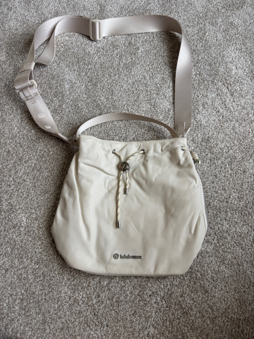 lululemon athletica light cream crossbody drawstring bag